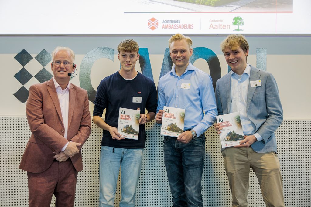 overhandiging boek door jan veuber